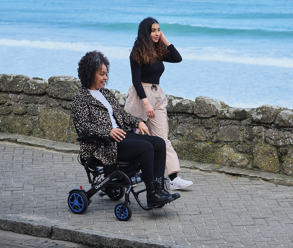 Motus - Quickie Q50 R Carbon on pavement by sea